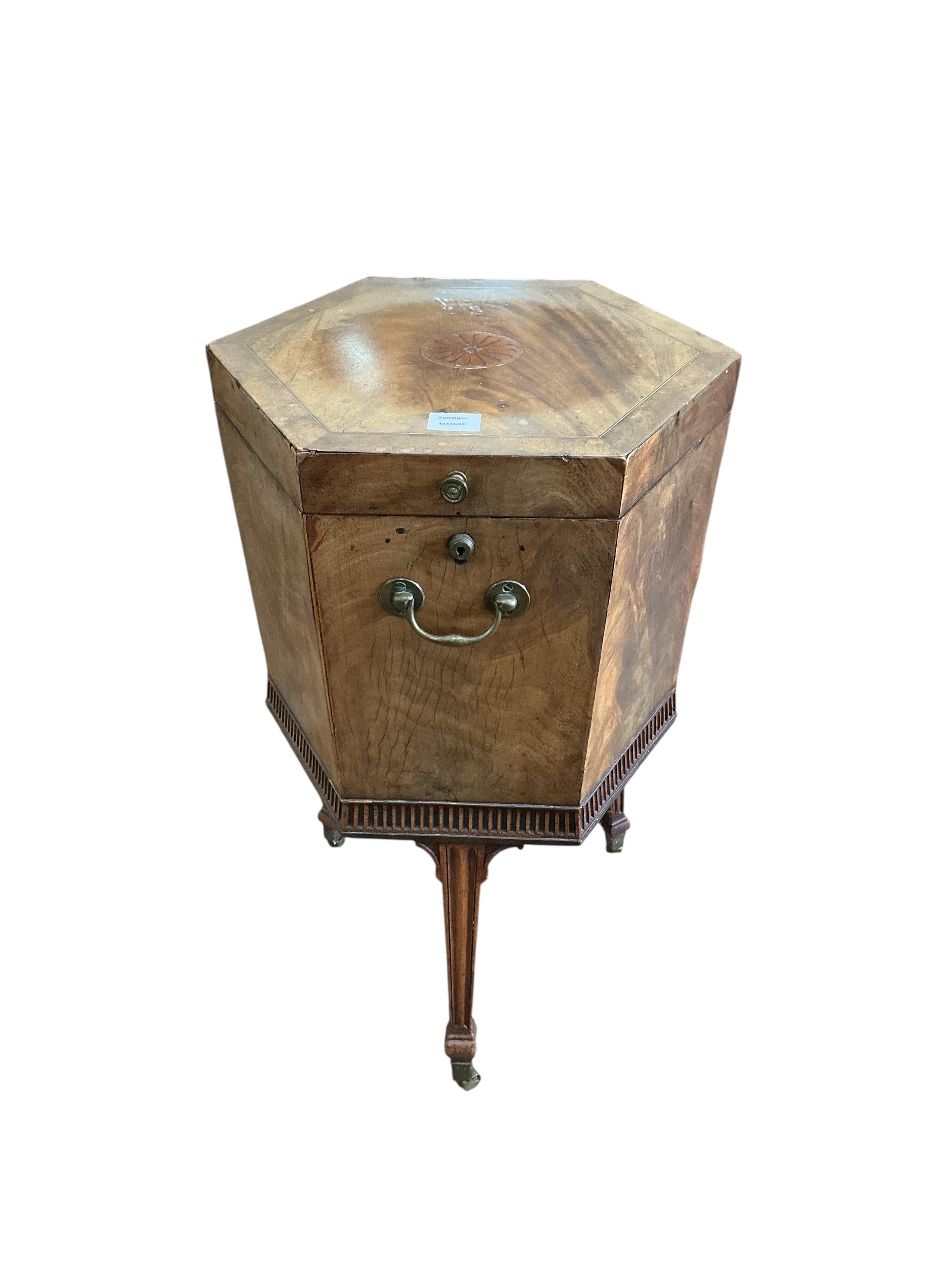 A George III inlaid mahogany hexagonal cellarette, width 47cm, height 75cm